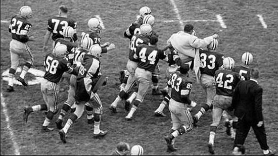 1959 Packers Carry Vince Lombardi off the field following opening victory over Bears